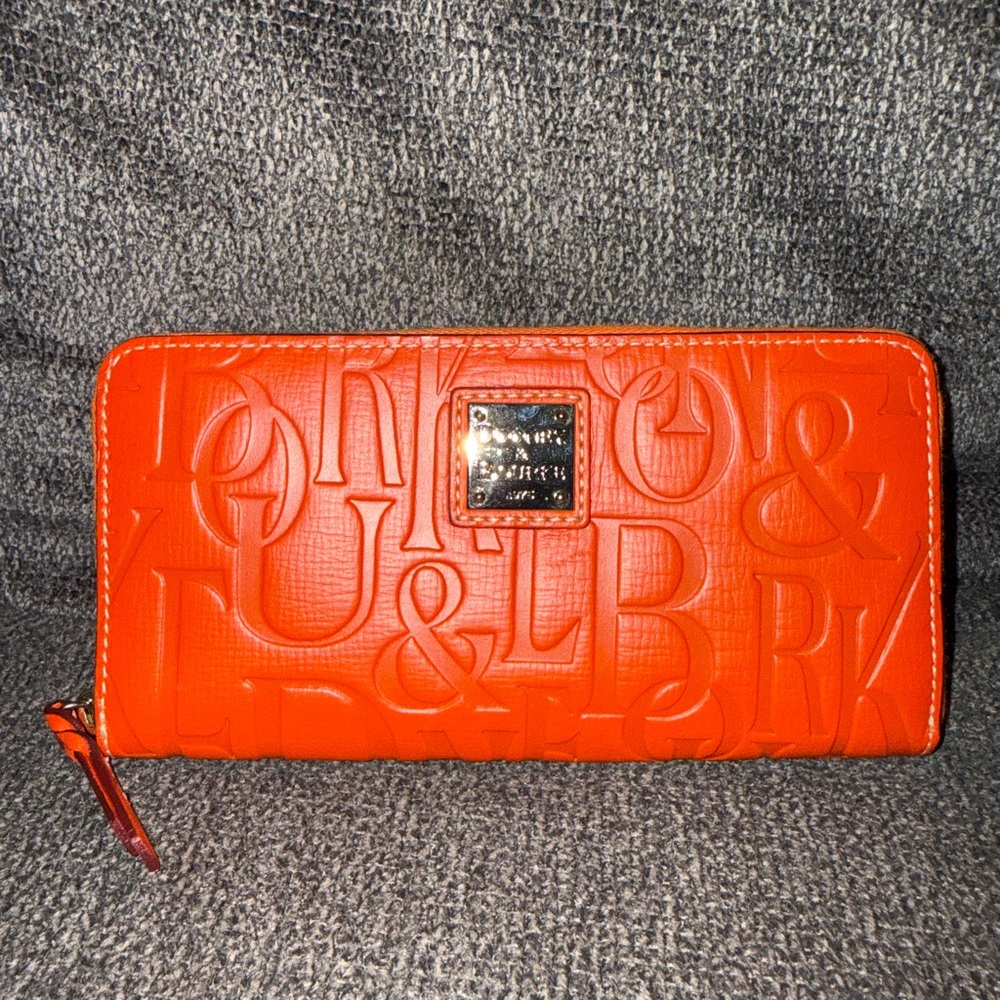 Dooney and Bourke retro embossed zip around wallet